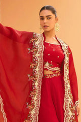 Cherry red embroidered cape and matching long dress with gold motif borders
