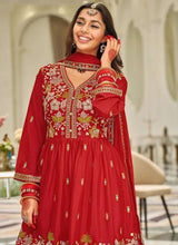 Ruby red embroidered tunic suit set with detailed neckline, cuffs, and full flared skirt