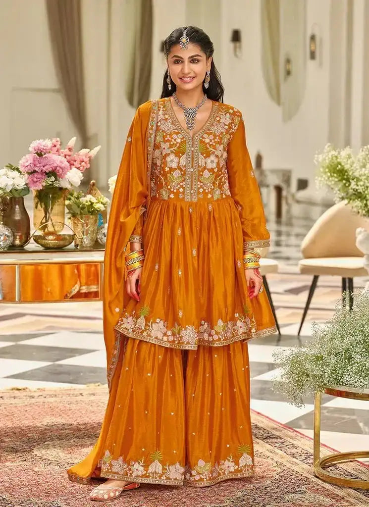 Rust orange embroidered tunic with floral hem border and matching sharara pants, full set