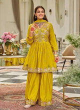 Mustard yellow embroidered tunic and sharara suit set with gold trim and long straight pants