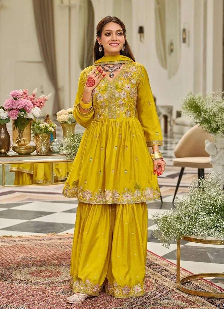 Mustard yellow embroidered tunic with floral motifs and matching sharara pants, full set