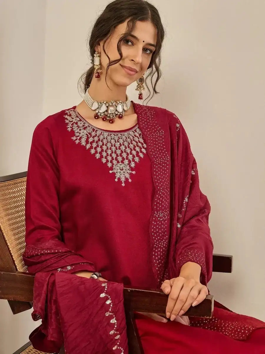 Deep maroon embroidered neckline kurta with 3/4 sleeves and sheer dupatta detail