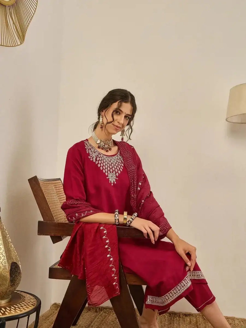 Maroon embroidered suit set with detailed yoke and draped dupatta