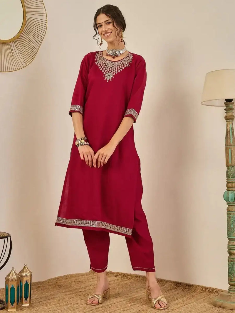 Maroon embroidered suit set with matching pants and draped dupatta