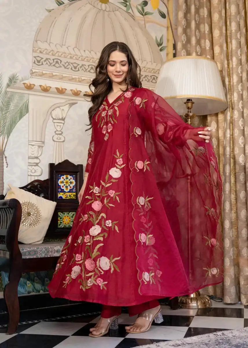 Muslin Anarkali suit set in dark ruby red with large floral embroidery and flowing dupatta