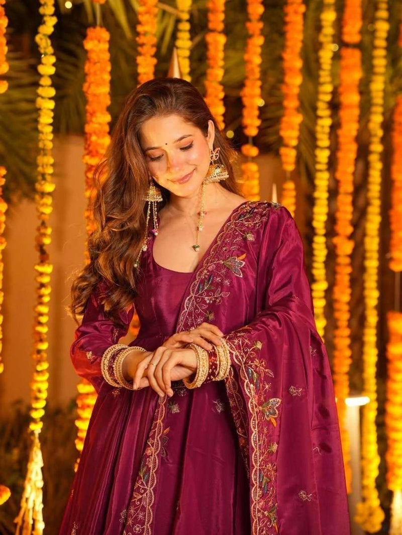 Embroidered anarkali dress in deep wine purple with floral work and gold trim