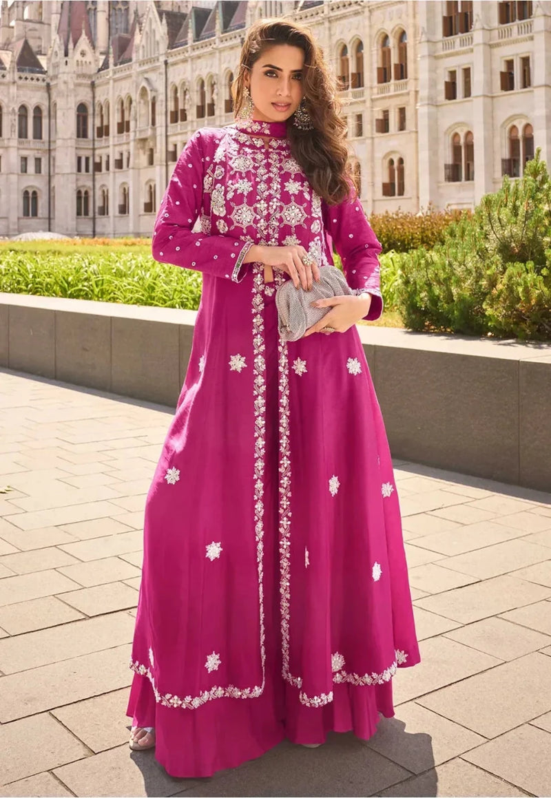 Fuchsia Pakistani suit with heavy white floral embroidery and front slit, long sleeves