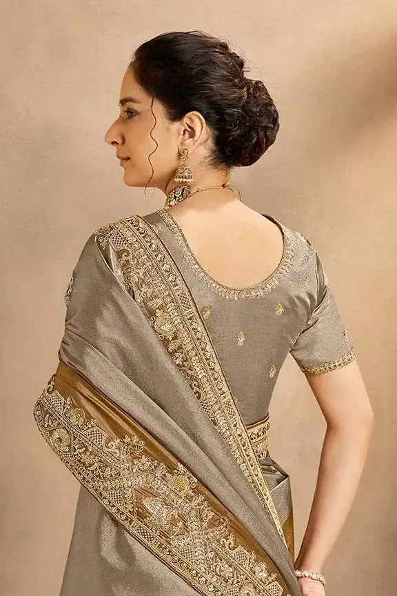 Grey-bronze silk saree with gold embroidered border and short-sleeve blouse
