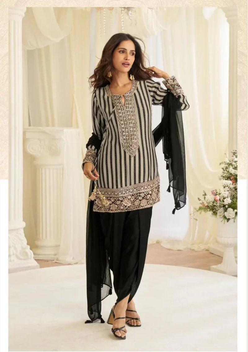 Grey striped Farsi suit with beaded hem, black pants, and sheer dupatta