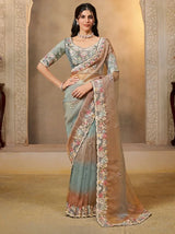Grey-teal tissue silk saree with bronze scalloped embroidered border, full drape