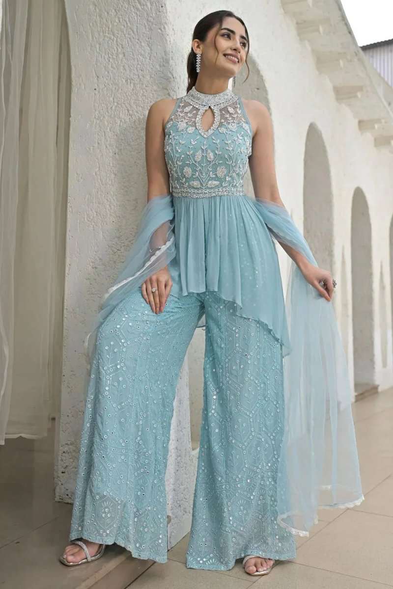 Icy powder blue palazzo pants with mirror work and matching peplum top, sheer dupatta