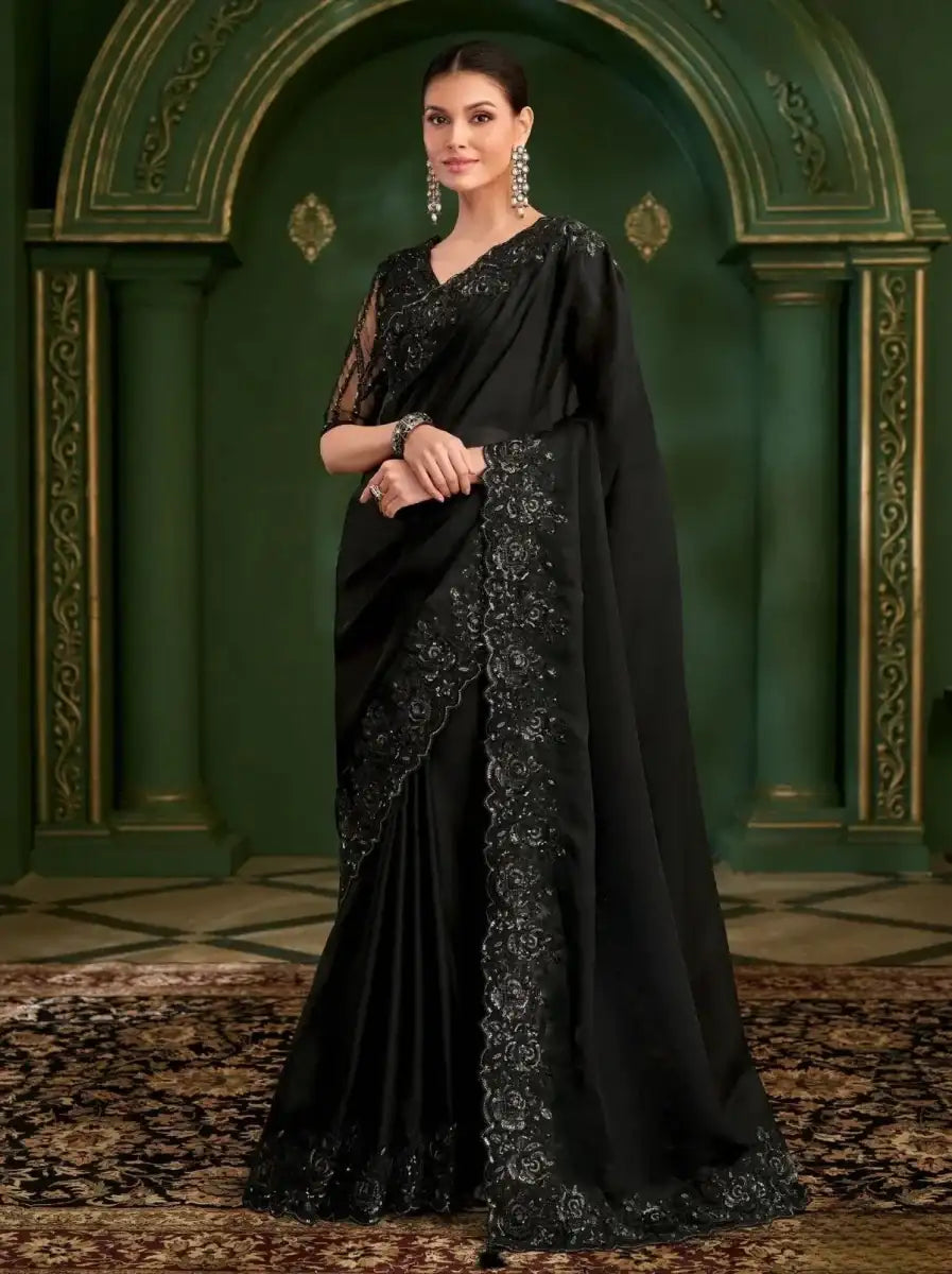 Black georgette silk saree with monochrome embroidered panel and draped pallu
