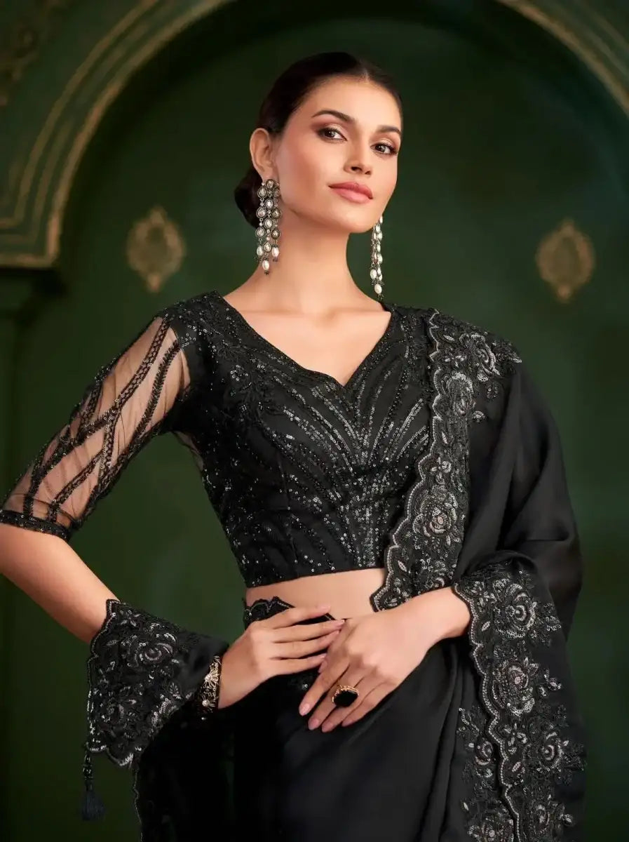 Black saree with V-neck blouse look and detailed embroidered bodice, sheer sleeves