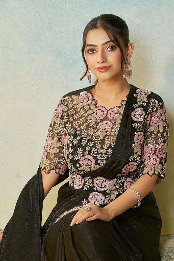Jet black satin saree set with pink rose embroidery on elbow-length sleeves