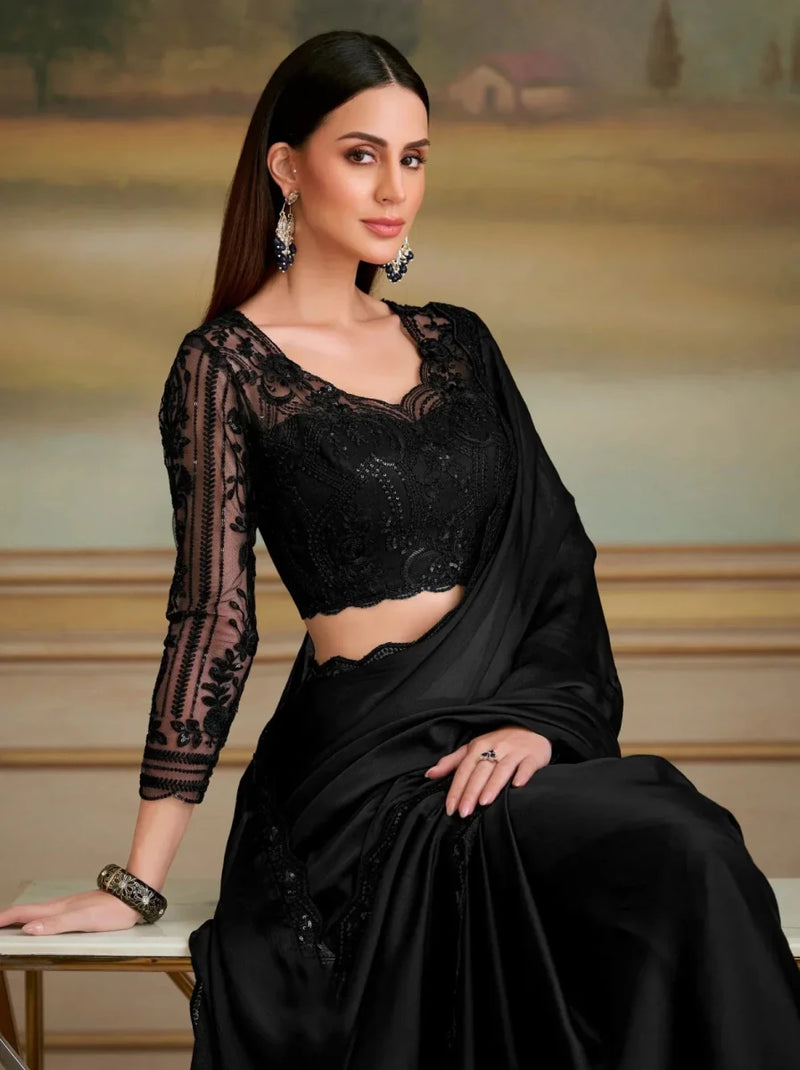 Black saree with sheer lace long sleeves blouse and scalloped neckline