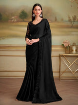 Black scalloped georgette saree with lace-trim sheer blouse, full drape