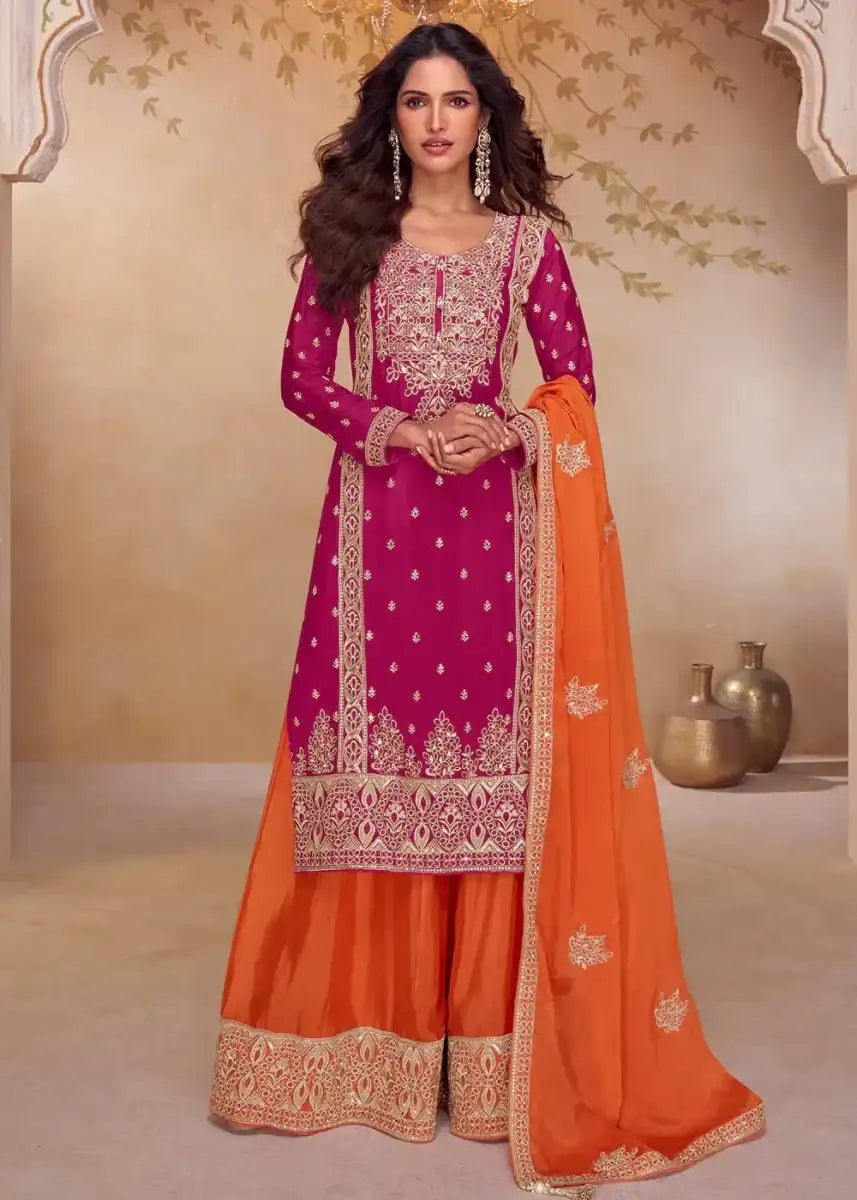 Magenta palazzo suit set with patterned hem, orange dupatta draped over sleeves