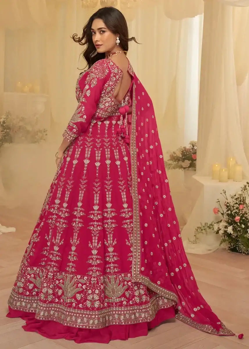 Magenta skirt set with allover gold embroidery, side view, sheer dupatta drape