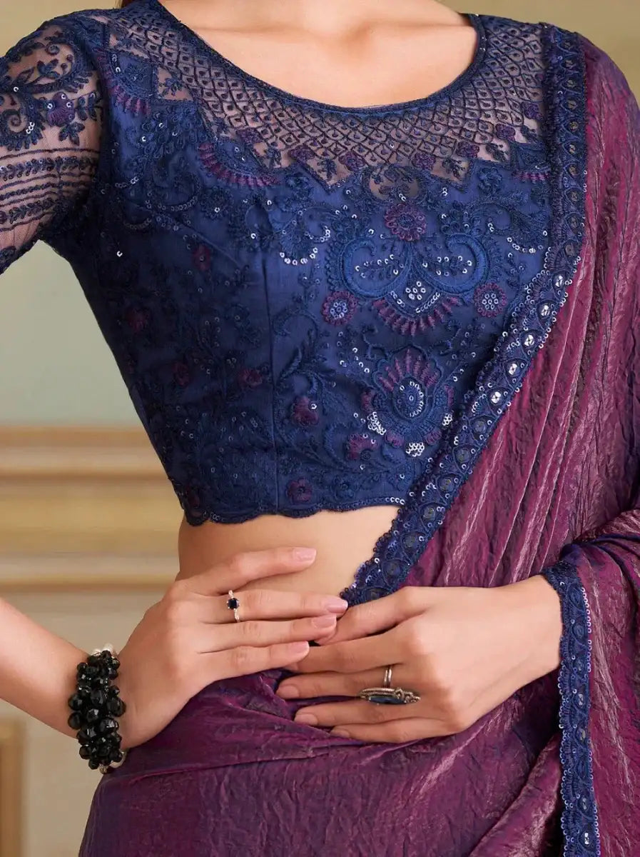 Midnight-blue embroidered blouse with aubergine purple metallic tissue saree drape