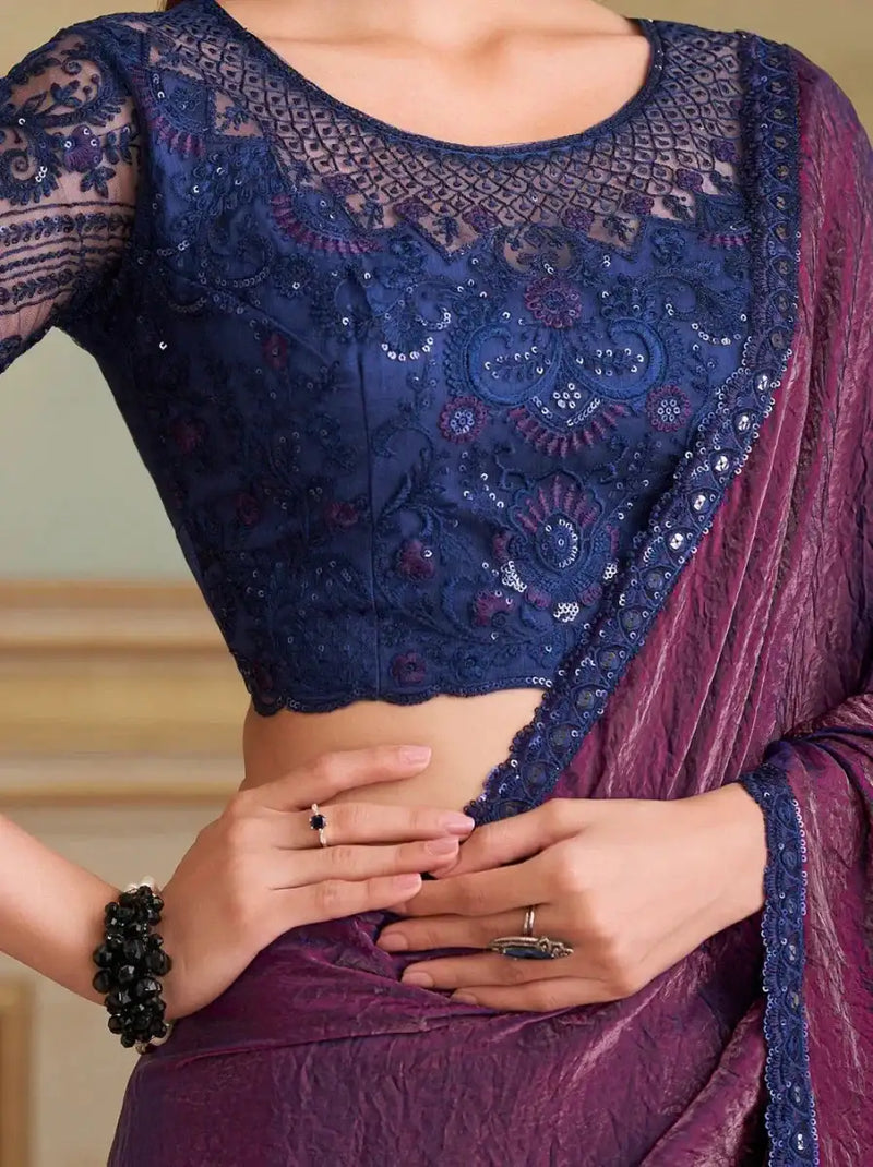 Midnight-blue embroidered blouse with aubergine purple metallic tissue saree drape