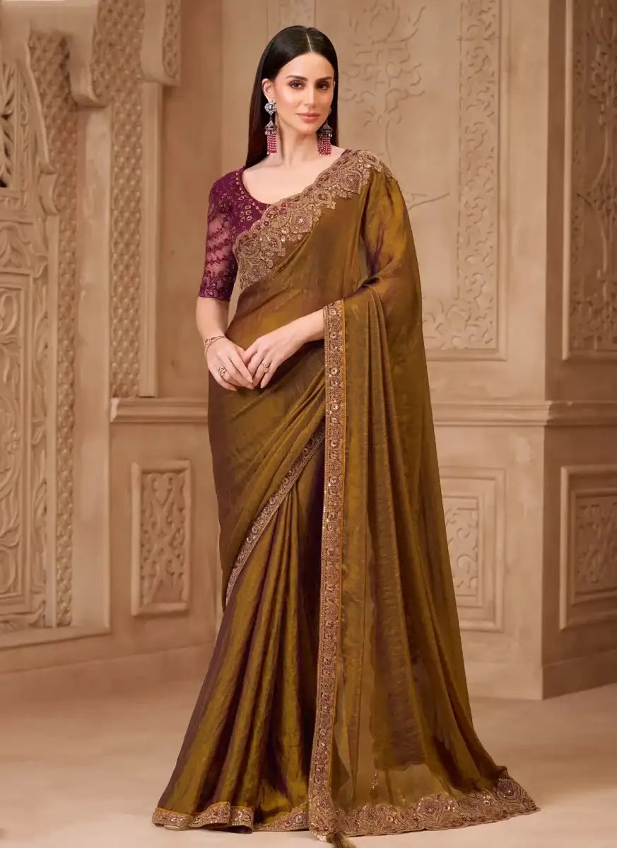 Burgundy embroidered blouse with bronze satin silk saree and gold border drape