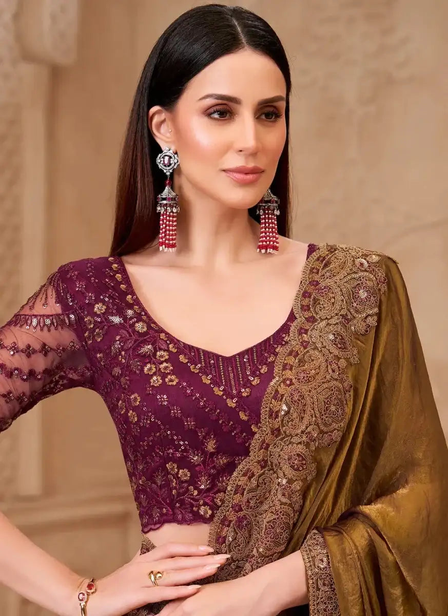 Wine blouse with gold embroidery and sheer sleeves, bronze pallu over shoulder