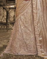 Champagne gold metallic satin lehenga saree skirt with ornate embroidered patterns
