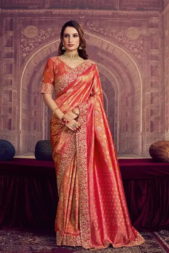 Metallic coral pink Kanjivaram silk saree with gold scalloped border and pallu drape