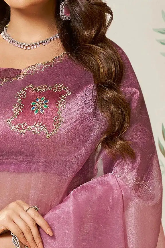 Mauve pink satin organza saree with gold embroidered floral motif and round neckline