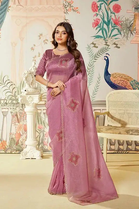 Mauve satin organza saree with gold embroidery and flowing drape, border detail
