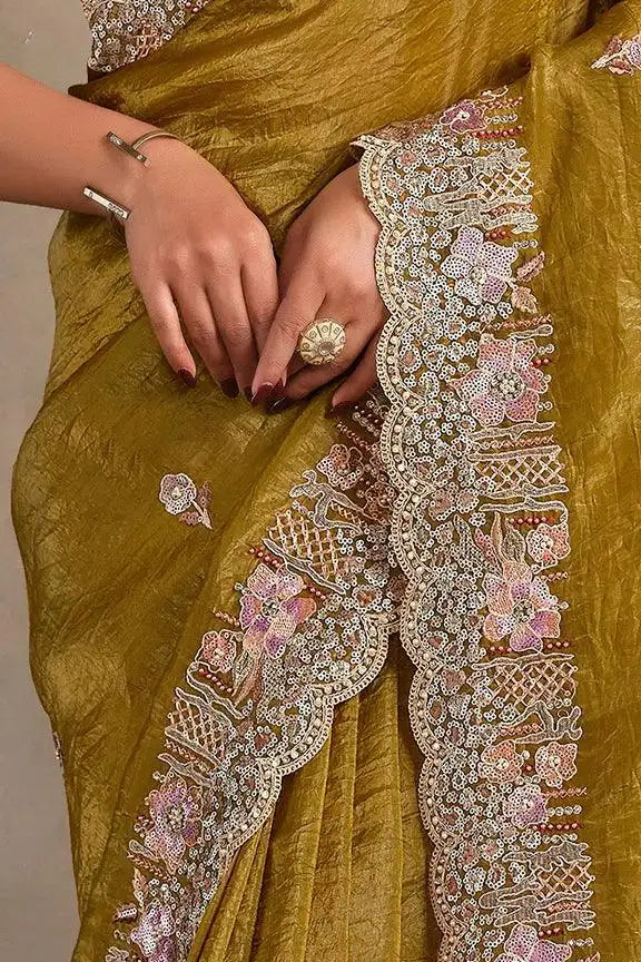 Olive-gold saree pleats with wide floral scalloped border and beadwork