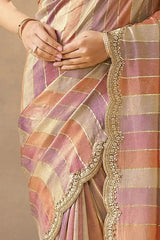 Pastel multi-stripe silk saree with metallic gold lace-edged pallu and border