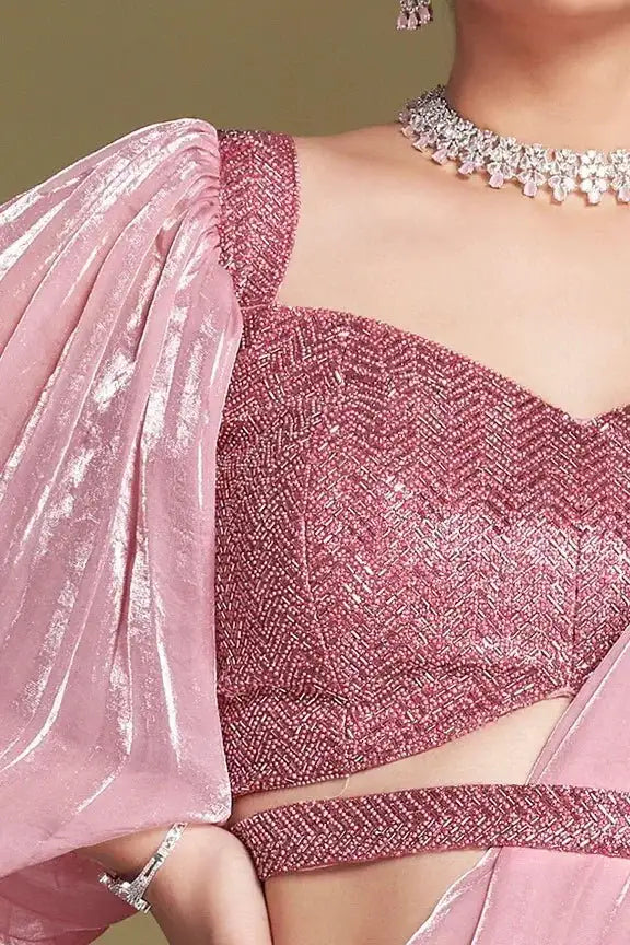 Rose pink ready-to-wear saree detail: metallic V-neck bodice with puffed sleeve.