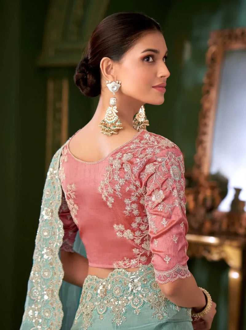 Pink blouse back with sky blue saree panel, floral embroidery and elbow-length sleeves