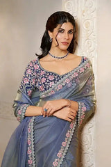 Metallic steel blue saree with floral embroidered neckline and matching border