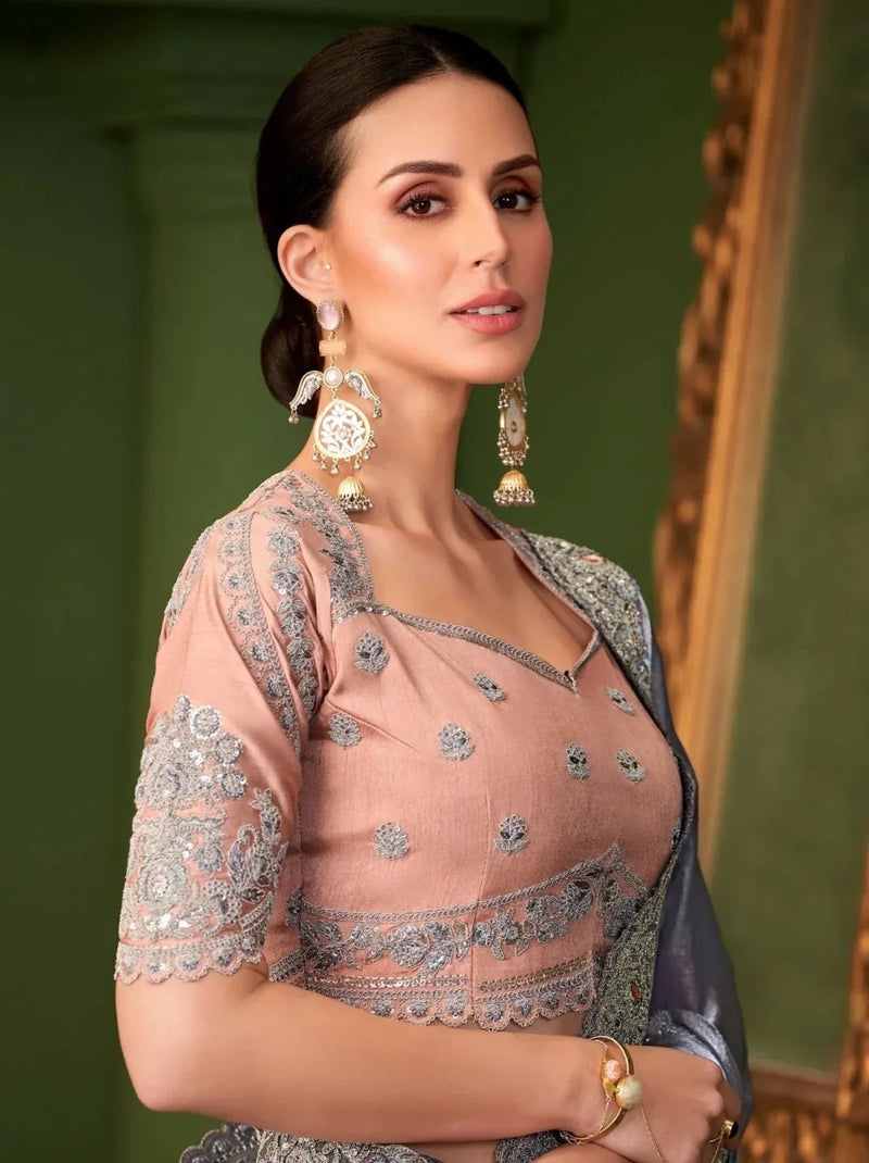 Metallic steel lavender saree with gold embroidered blouse and scalloped neckline detail