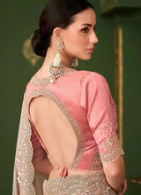 Blush pink blouse with open back and gold embroidered metallic taupe drape