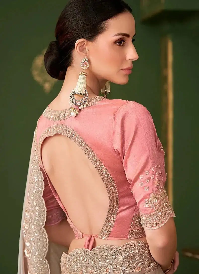 Blush pink blouse with open back detail and metallic taupe embroidered saree