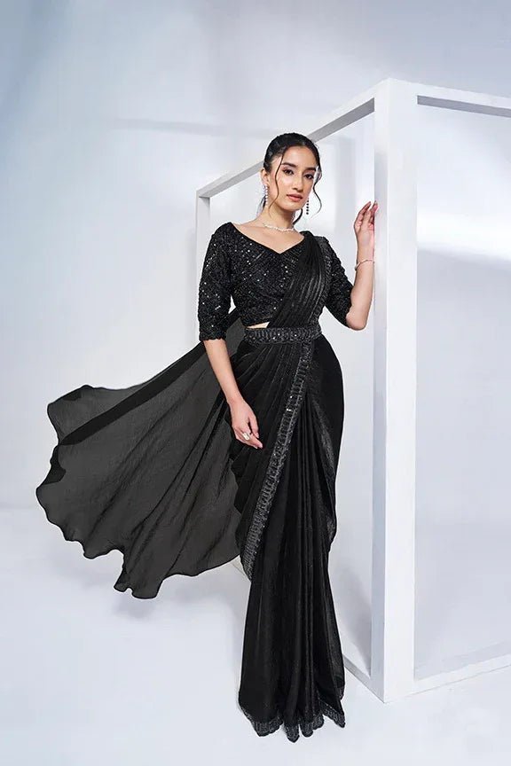 Nayoora Luxe black sequin saree set with pleated drape and elbow-length sleeves