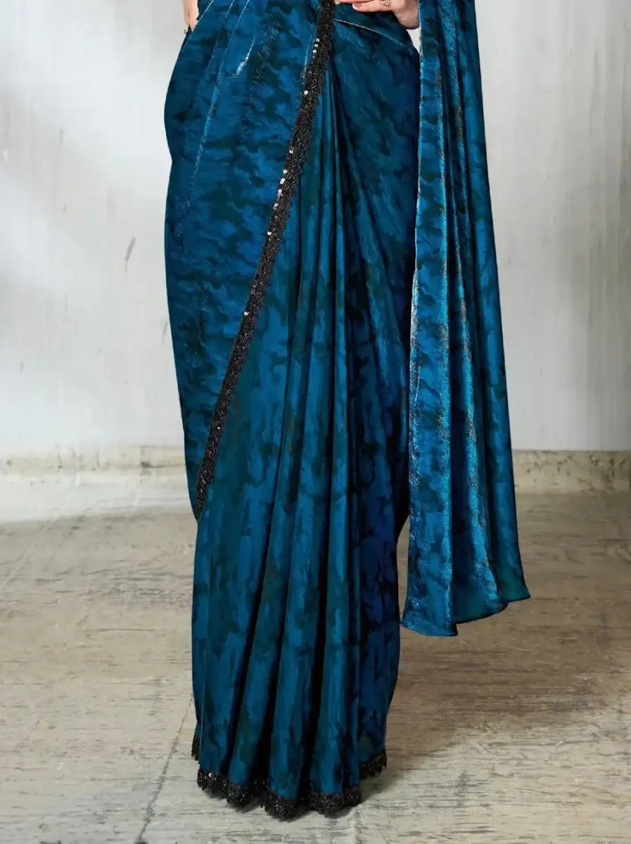 Teal satin saree with pleated skirt and black edge border, ready-to-wear