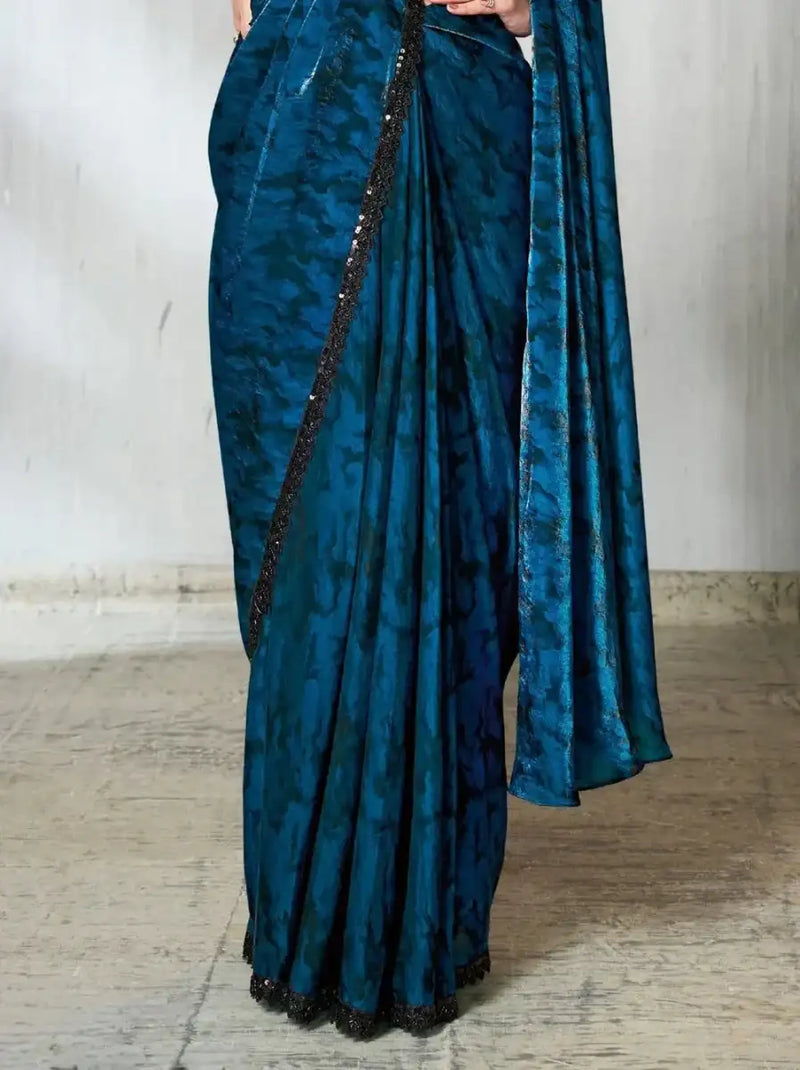 Midnight teal satin saree with pleated drape and black border trim