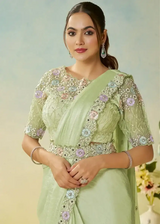 Mint green satin saree set with floral embroidered blouse, draped saree