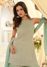Mint green sleeveless embroidered kurta with round neckline and shimmering texture