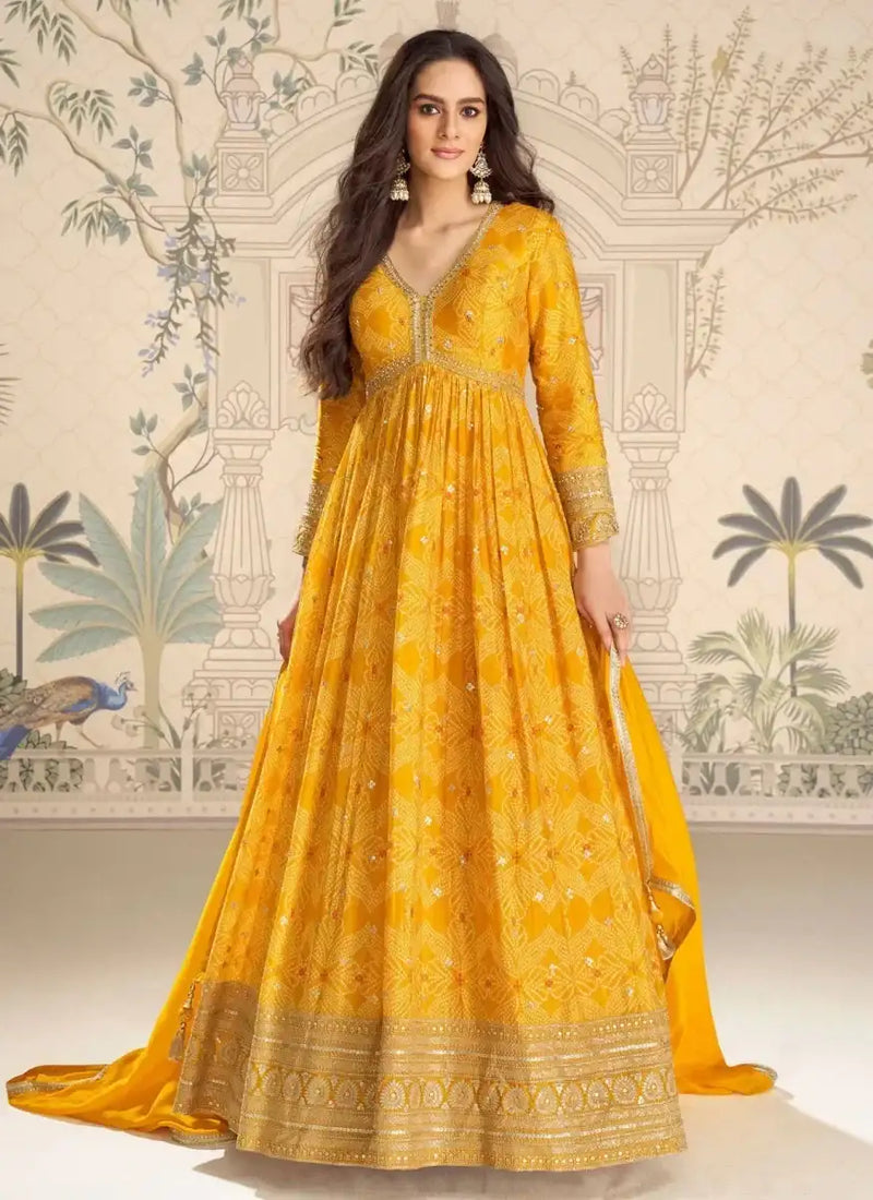 Mustard yellow bandhani silk embroidered maxi gown with V-neck and long sleeves