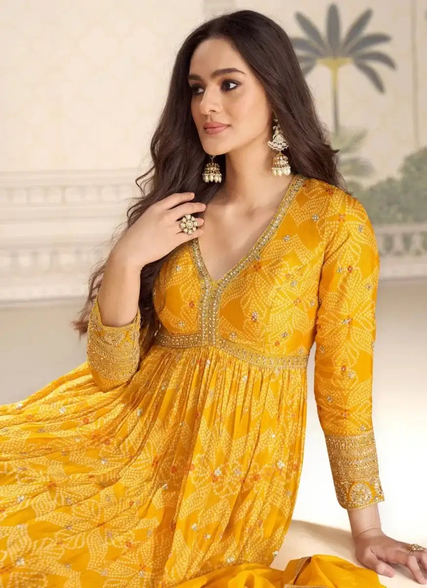 Mustard yellow embroidered bandhani silk gown, V-neck with gathered waist and sleeves