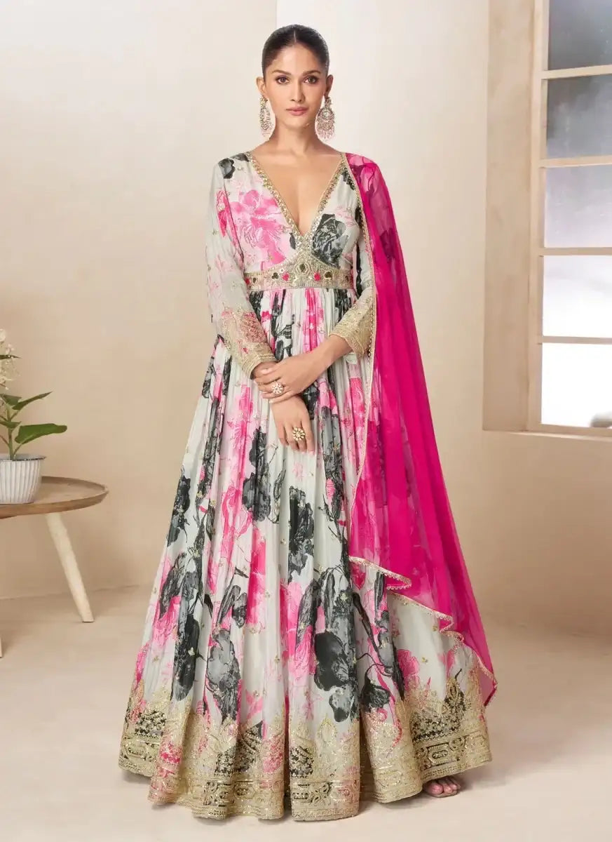 Off-white floral embroidered gown with pink dupatta, long sleeves and flared skirt
