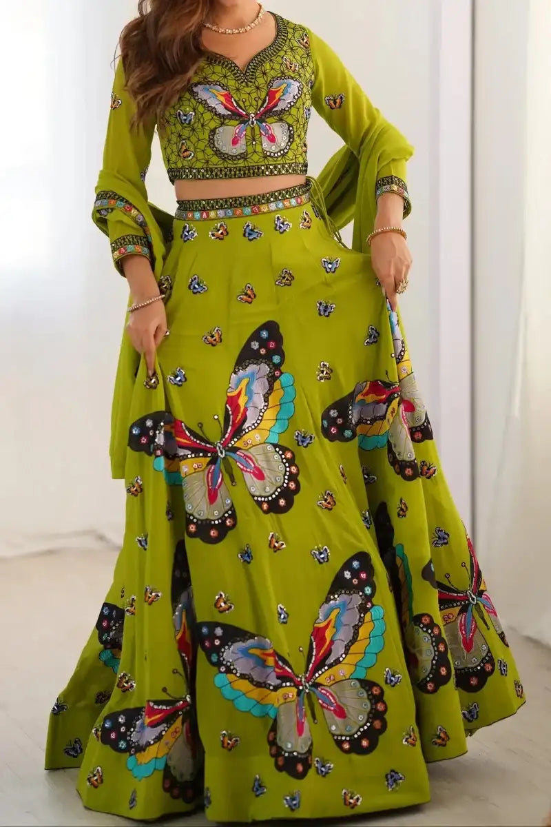 Green butterfly-print lehenga set with embroidered bodice and full gathered skirt