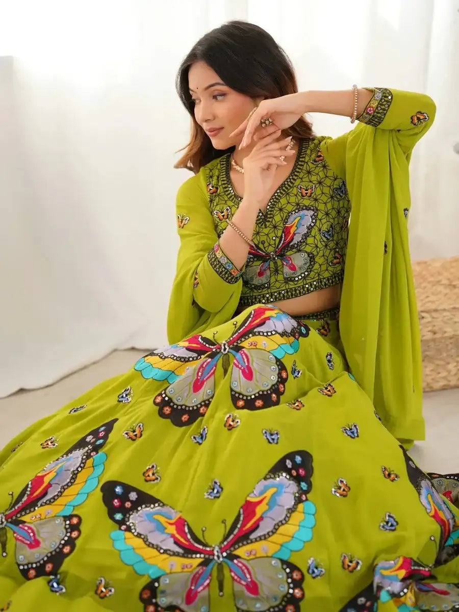 Green butterfly-print lehenga with three-quarter sleeve blouse and full flared skirt