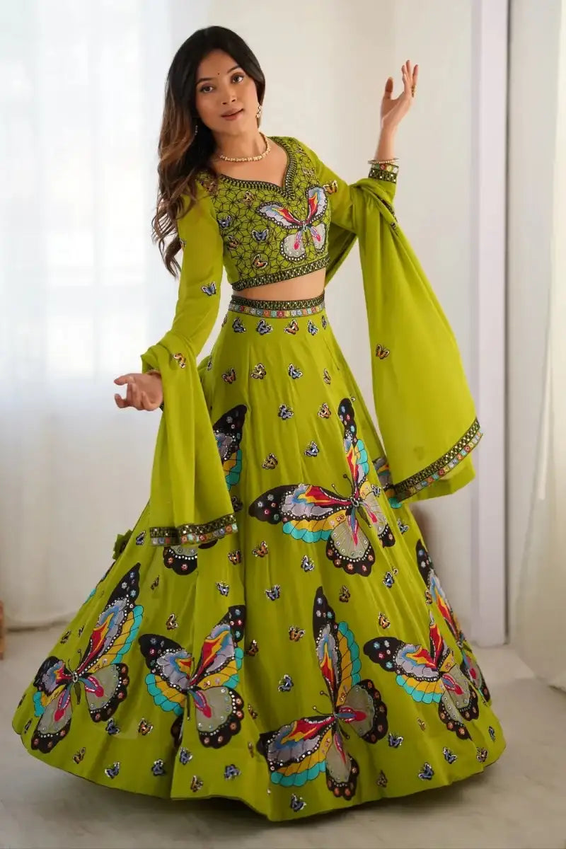 Green butterfly-print georgette lehenga with cropped long-sleeve blouse and belt detail