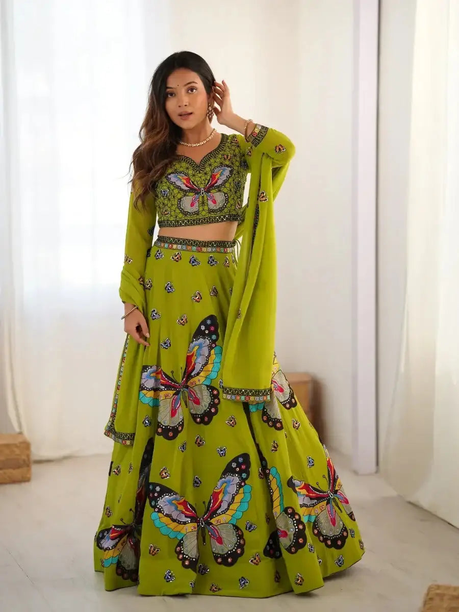 Green butterfly-print lehenga with embroidered blouse and tiered flared skirt